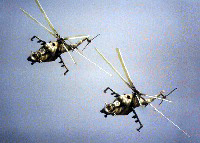 Two Mi-24 in flight