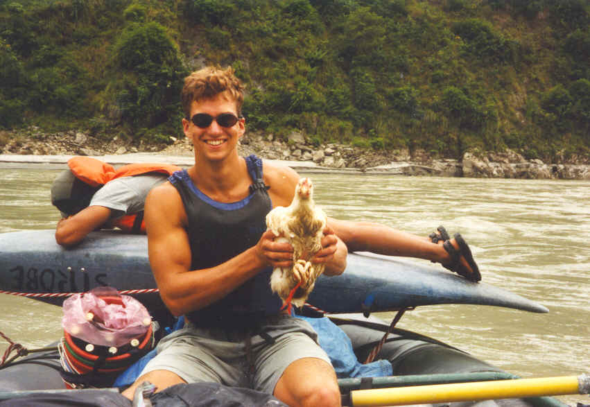 Rowing a gear raft on the Kali Ghandaki with our dinner for the evening!