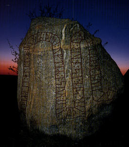 Red-painted runes on a runic stone