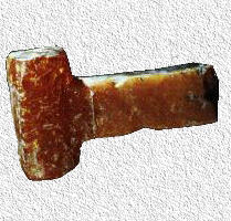 A Thor-hammer made of amber in a more simple design. It was usually part of a necklace to infuse strenght to the one carrying it.