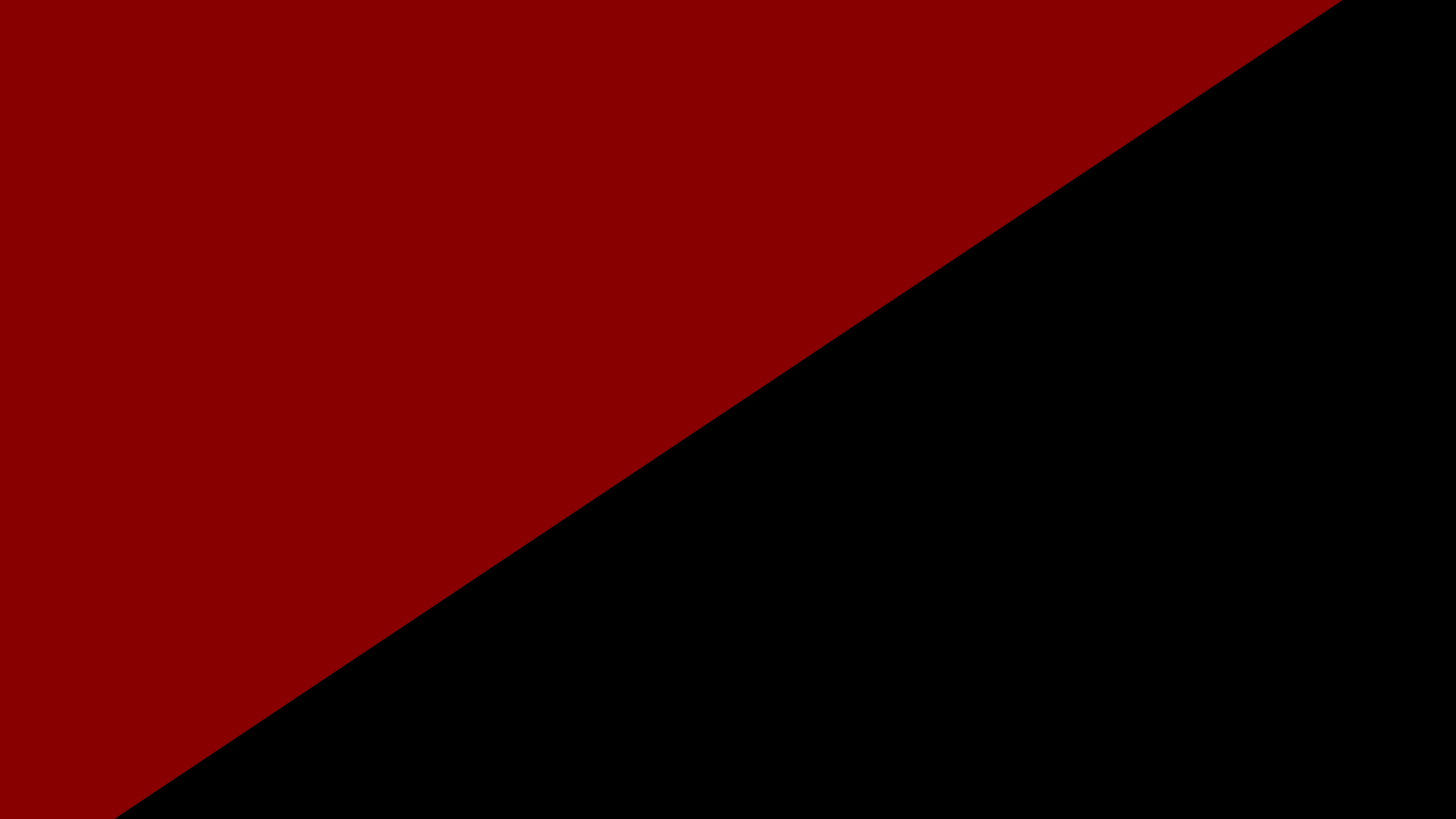 A cropped and darkened version of a modern anarchist flag, the red-and-black bisected flag.